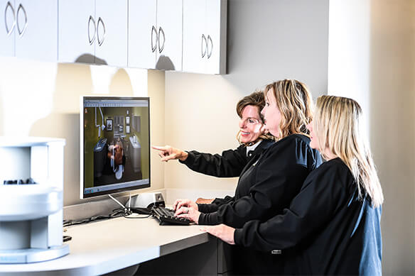 staff looking at computer