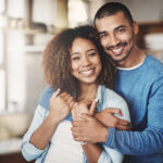 smiling Black couple, cosmetic dentistry