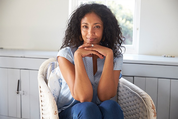 woman slightly smiling