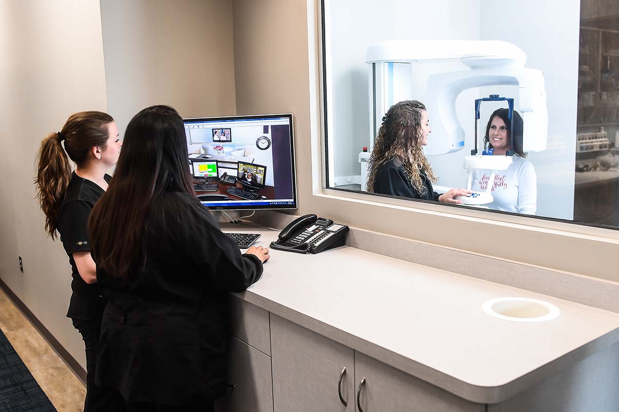 staff working with patient