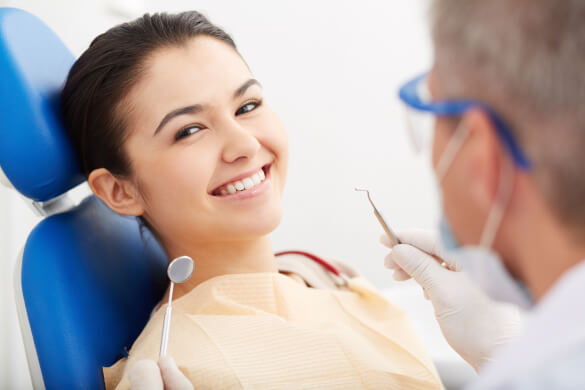 young lady at the dentist