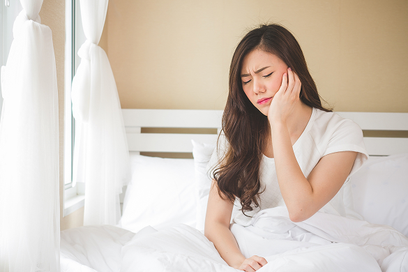woman with mouth pain