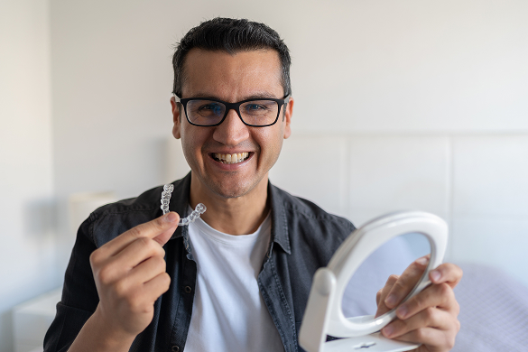 man with clear aligner